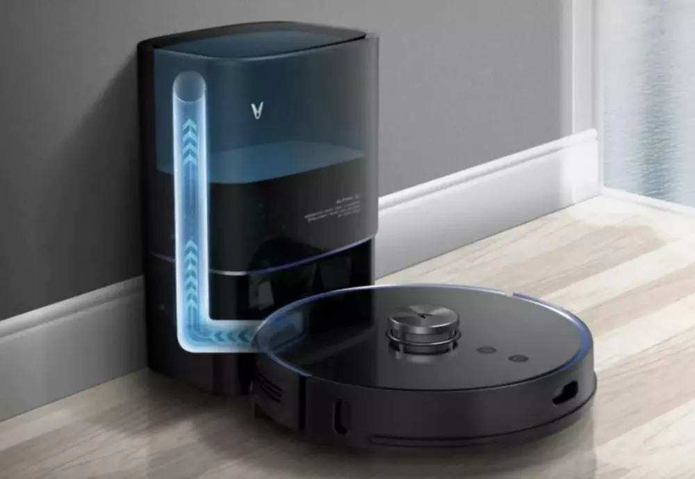 Robotic vacuum cleaner docking at charging station.